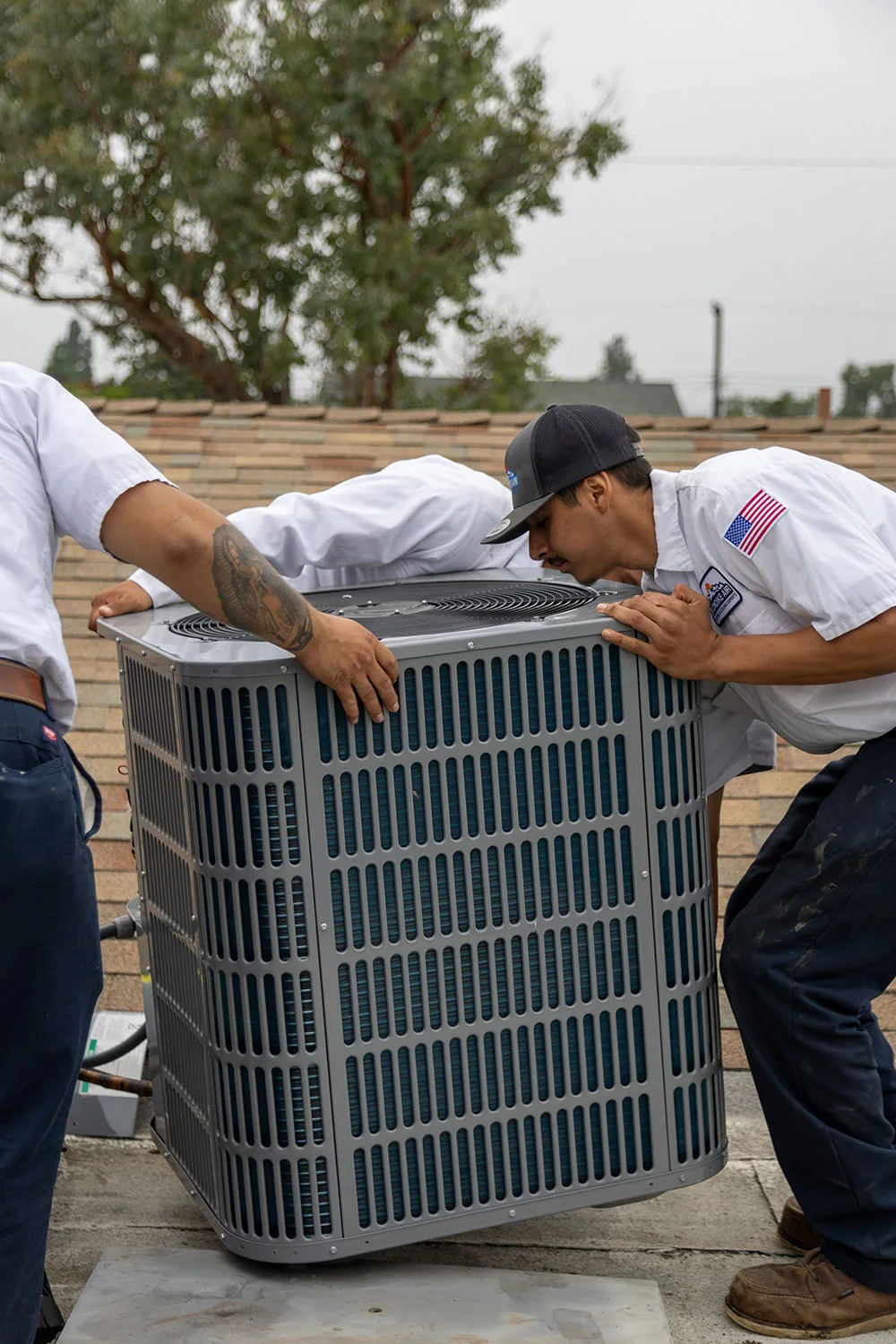 HVAC Technician Replacing HVAC Unit in Irvine